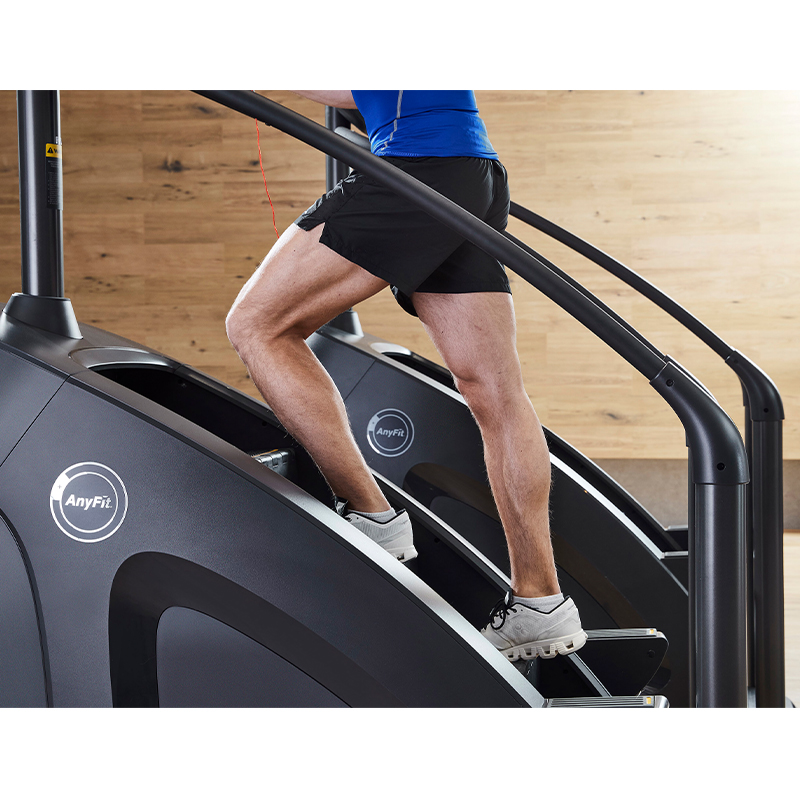 How can the aerobic exercise mode of stair climbers be designed to better conform to human biomechanics?